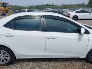 2019 Toyota Corolla L with VIN 5YFBURHE8KP949824, listed as a IAAI auction lot 41904385 with 112,054 mi miles. Bid and sale history available at carsss.com. Image 13.