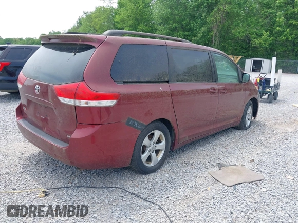 2011 Toyota Sienna LE AAS with VIN 5TDKK3DC2BS003748, listed as a IAAI auction lot 42142090 with 246,737 mi miles. Bid and sale history available at carsss.com. Image 4.