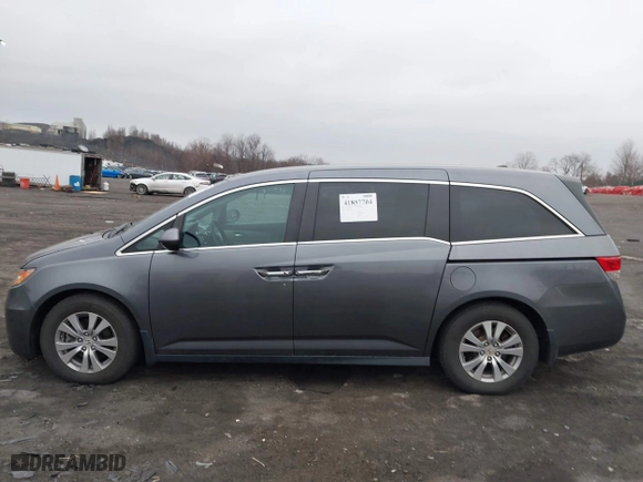 2016 Honda Odyssey SE with VIN 5FNRL5H3XGB150025, listed as a IAAI auction lot 41857704 with 69,515 mi miles. Bid and sale history available at carsss.com. Image 14.