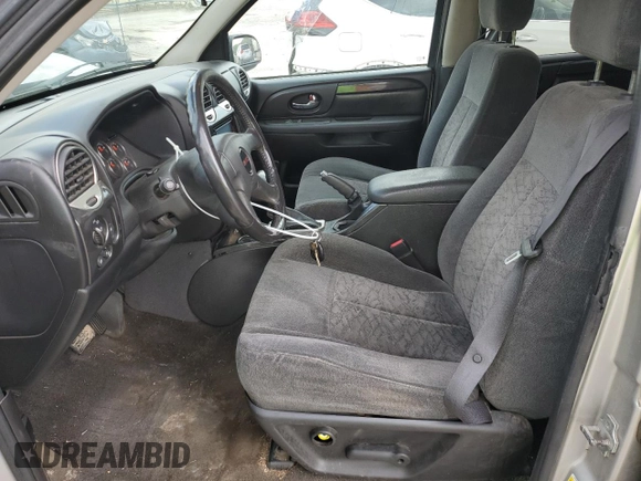 2006 GMC Envoy SLE with VIN 1GKDT13S662223768, listed as a Copart auction lot 55026335 with 149,787 mi miles and Salvage title. Bid and sale history available at DreamBid. Image 7.