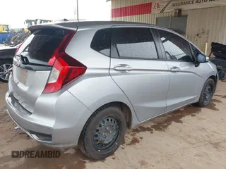 2018 Honda Fit LX with VIN 3HGGK5H4XJM735209, listed as a IAAI auction lot 42348191 with 161,902 mi miles and . Bid and sale history available at DreamBid. Image 4.