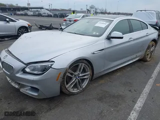 2013 BMW 6 Series 650i xDrive with VIN WBA6B4C53DD098486, listed as a IAAI auction lot 42038491 with 97,771 mi miles. Bid and sale history available at carsss.com. Image 2.