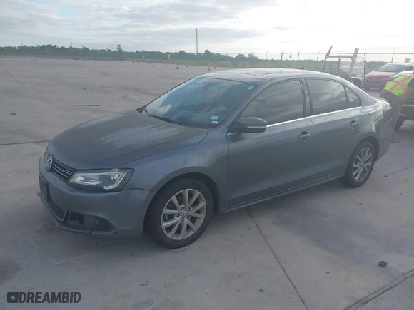 2014 Volkswagen Jetta Sedan SE with VIN 3VWD07AJ6EM401605, listed as a IAAI auction lot 42035536 with 207,968 mi miles. Bid and sale history available at carsss.com. Image 2.