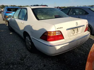 2000 Acura RL with VIN JH4KA9654YC000685, listed as a Copart auction lot 73986054 with 0 mi miles and Salvage Title. Bid and sale history available at carsss.com. Image 2.
