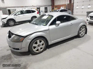 2002 Audi TT with VIN TRUWC28N521010684, listed as a IAAI auction lot 42116565 with 130,917 mi miles. Bid and sale history available at carsss.com. Image 2.