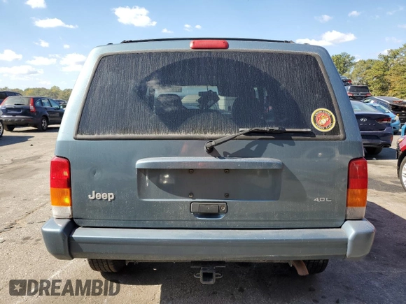 1998 Jeep Cherokee Sport with VIN 1J4FT68S4WL121559, listed as a Copart auction lot 77387794 with 163,453 mi miles and Salvage Title. Bid and sale history available at carsss.com. Image 6.