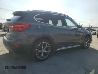 2018 BMW X1 sDrive28i with VIN WBXHU7C35J5L09783, listed as a Copart auction lot 55147935 with 37,114 mi miles and Salvage Title. Bid and sale history available at DreamBid. Image 3.