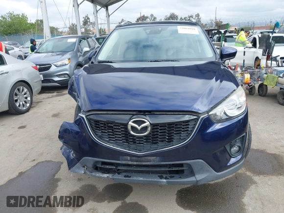 2014 Mazda CX-5 Grand Touring with VIN JM3KE2DY1E0307911, listed as a IAAI auction lot 42064898 with 133,934 mi miles. Bid and sale history available at carsss.com. Image 13.