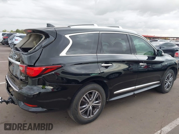 2018 Infiniti QX60 with VIN 5N1DL0MN2JC515852, listed as a IAAI auction lot 42174867 with 72,204 mi miles and . Bid and sale history available at DreamBid. Image 4.