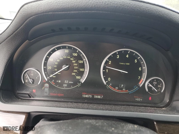 2012 BMW 7 Series 750i xDrive with VIN WBAKC6C52CC396443, listed as a Copart auction lot 44333945 with 134,075 mi miles and Salvage Title. Bid and sale history available at carsss.com. Image 9.