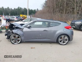 2014 Hyundai Veloster with VIN KMHTC6AD5EU183478, listed as a IAAI auction lot 42107170 with 64,905 mi miles. Bid and sale history available at carsss.com. Image 12.