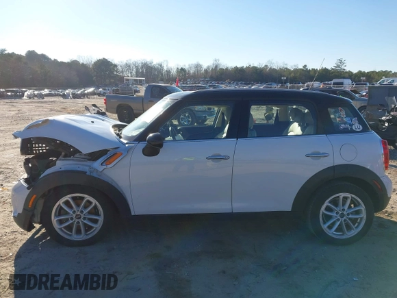 2015 MINI Countryman z VIN WMWZB3C53FWR43884, wystawiony jako IAAI lot #41296213 z przebiegiem 111 934 mil mil oraz . Historia ofert i sprzedaży dostępna na DreamBid. Obrazek 15.