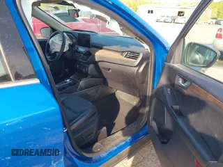 2020 Ford Escape Titanium Hybrid with VIN 1FMCU9DZ1LUB59214, listed as a IAAI auction lot 42050336 with 59,547 mi miles and . Bid and sale history available at DreamBid. Image 5.