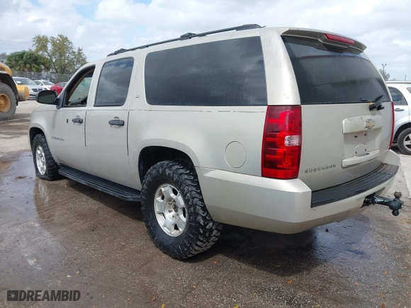 2009 Chevrolet Suburban LS with VIN 1GNFC16069R191034, listed as a IAAI auction lot 41583684 with 195,900 mi miles. Bid and sale history available at carsss.com. Image 3.