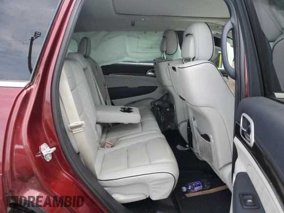 2019 Jeep Grand Cherokee Summit with VIN 1C4RJEJGXKC716175, listed as a Copart auction lot 58656005 with 68,431 mi miles and Salvage title. Bid and sale history available at DreamBid. Image 11.
