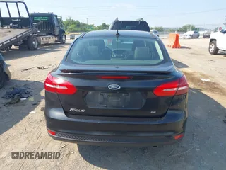 2015 Ford Focus SE z VIN 1FADP3F25FL284097, wystawiony jako IAAI lot #42553323 z przebiegiem 139 647 mil mil oraz . Historia ofert i sprzedaży dostępna na DreamBid. Obrazek 16.