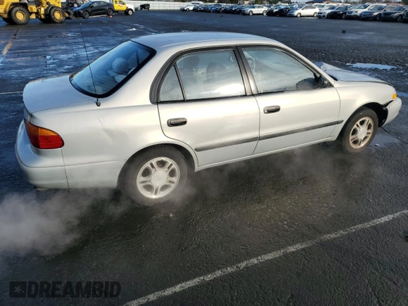 2002 Chevrolet Prizm z VIN 1Y1SK52842Z404089, wystawiony jako Copart lot #49103545 z przebiegiem 134 794 mil mil oraz Szkoda całkowita • Salvage title. Historia ofert i sprzedaży dostępna na DreamBid. Obrazek 3.