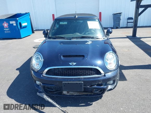 2014 MINI Convertible S z VIN WMWZP3C53ET706796, wystawiony jako IAAI lot #42363811 z przebiegiem 93 581 mil mil oraz . Historia ofert i sprzedaży dostępna na DreamBid. Obrazek 12.