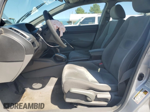 2010 Honda Civic LX with VIN 19XFA1F51AE016877, listed as a Copart auction lot 52275475 with 217,152 mi miles and Salvage Title. Bid and sale history available at DreamBid. Image 7.