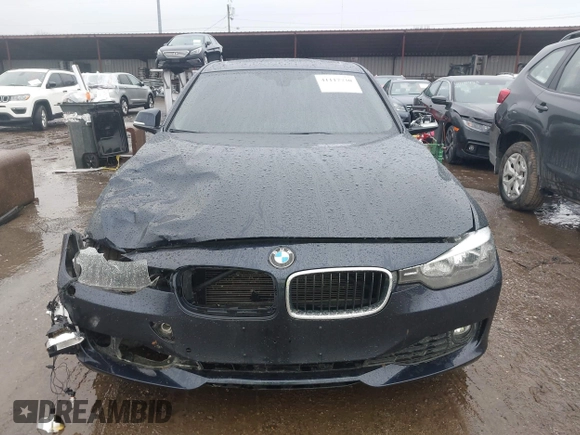 2015 BMW 3 Series 320i xDrive with VIN WBA3C3C57FP664631, listed as a IAAI auction lot 41117730 with 102,555 mi miles and . Bid and sale history available at DreamBid. Image 12.