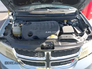 2013 Dodge Journey SXT with VIN 3C4PDCBG4DT584135, listed as a IAAI auction lot 41902149 with 165,700 mi miles and . Bid and sale history available at carsss.com. Image 10.