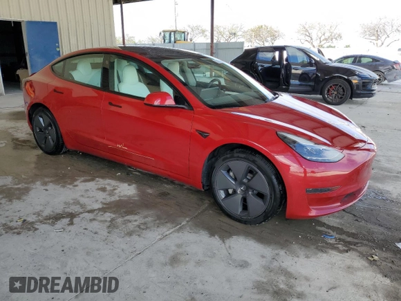2022 Tesla Model 3 with VIN 5YJ3E1EA0NF329568, listed as a Copart auction lot 52594205 with 27,446 mi miles and Non Repairable. Bid and sale history available at carsss.com. Image 4.