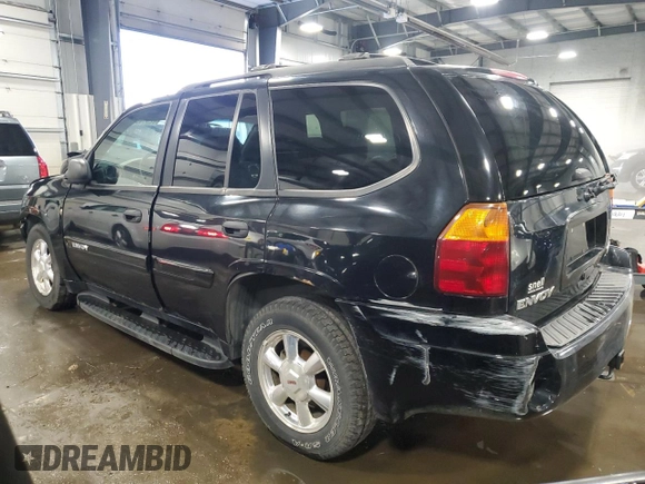 2004 GMC Envoy SLT with VIN 1GKDT13S642191868, listed as a Copart auction lot 82334304 with 150,810 mi miles and Salvage Title. Bid and sale history available at carsss.com. Image 2.