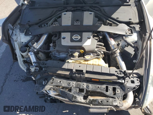 2014 Nissan 370Z Nismo with VIN JN1AZ4EH2EM633022, listed as a Copart auction lot 46947575 with 115,042 mi miles and Salvage Title. Bid and sale history available at DreamBid. Image 12.