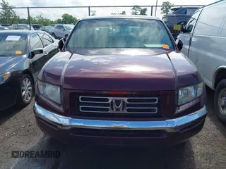 2007 Honda Ridgeline RTL with VIN 2HJYK16587H518901, listed as a IAAI auction lot 42762425 with 206,243 mi miles and . Bid and sale history available at DreamBid. Image 6.