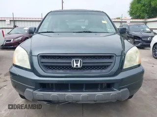 2005 Honda Pilot EX-L with VIN 5FNYF18565B046464, listed as a IAAI auction lot 41879495 with 228,021 mi miles. Bid and sale history available at carsss.com. Image 13.