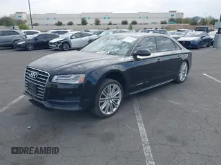 2017 Audi A8 L with VIN WAU44AFD5HN009133, listed as a IAAI auction lot 41352816 with 121,413 mi miles. Bid and sale history available at carsss.com. Image 2.