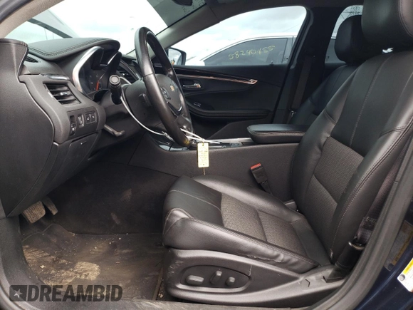 2016 Chevrolet Impala LT with VIN 2G1105SA9G9200570, listed as a Copart auction lot 58587575 with 133,489 mi miles and Salvage title. Bid and sale history available at DreamBid. Image 7.