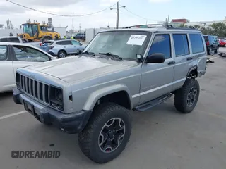 2000 Jeep Cherokee z VIN 1J4FF48S1YL200458, wystawiony jako IAAI lot #42239282 z przebiegiem Nie podano mil oraz . Historia ofert i sprzedaży dostępna na DreamBid. Obrazek 19.