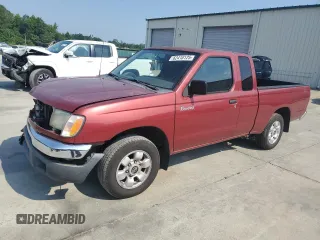 2000 Nissan Frontier XE with VIN 1N6DD26SXYC393054, listed as a Copart auction lot 62410125 with 106,319 mi miles and Salvage title. Bid and sale history available at DreamBid. Image 1.