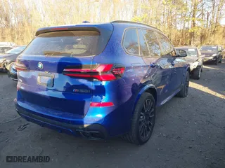 2025 BMW X5 M60i with VIN 5UX33EU04S9W34632, listed as a IAAI auction lot 41274184 with 5,943 mi miles. Bid and sale history available at carsss.com. Image 4.