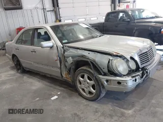 1999 Mercedes-Benz E-Class with VIN WDBJF82HXXX022432, listed as a IAAI auction lot 41793493 with 1 mi miles. Bid and sale history available at carsss.com. Image 1.