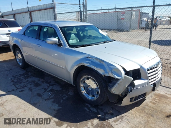 2006 Chrysler 300 Touring with VIN 2C3KA53G86H111027, listed as a IAAI auction lot 41870312 with 59,870 mi miles. Bid and sale history available at carsss.com. Image 1.