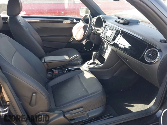 2015 Volkswagen Beetle with VIN 3VW5A7AT7FM811978, listed as a IAAI auction lot 41983986 with 84,421 mi miles and . Bid and sale history available at DreamBid. Image 5.