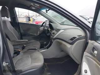 2015 Hyundai Accent GLS with VIN KMHCT4AE0FU927177, listed as a IAAI auction lot 41559026 with 181,703 mi miles. Bid and sale history available at carsss.com. Image 5.