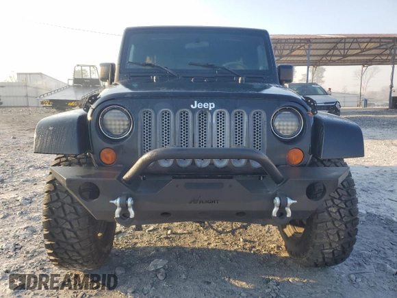 2010 Jeep Wrangler Unlimited Sahara with VIN 1J4BA5H10AL105857, listed as a Copart auction lot 46567075 with 144,147 mi miles and Clean Title. Bid and sale history available at carsss.com. Image 5.
