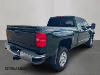 2015 GMC Sierra 2500HD available WiFi SLT with VIN 1GT12ZE82FF581685, listed as a Copart auction lot 54453955 with 185,110 mi miles and Clean Title. Bid and sale history available at carsss.com. Image 4.