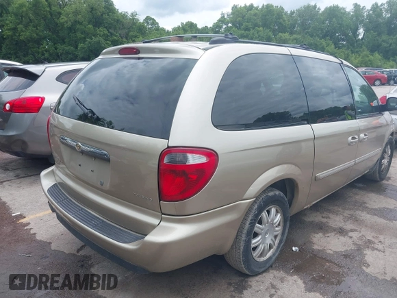 2005 Chrysler Town & Country Touring z VIN 2C8GP54L25R491310, wystawiony jako IAAI lot #42363567 z przebiegiem 203 608 mil mil oraz . Historia ofert i sprzedaży dostępna na DreamBid. Obrazek 4.