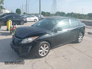 2011 Mazda 3 i Touring z VIN JM1BL1VG7B1362187, wystawiony jako IAAI lot #42210831 z przebiegiem 124 195 mil mil oraz . Historia ofert i sprzedaży dostępna na DreamBid. Obrazek 2.