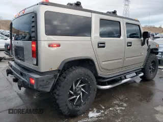 2006 Hummer H2 with VIN 5GRGN23U16H121476, listed as a Copart auction lot 86902654 with 143,202 mi miles and Salvage Title. Bid and sale history available at carsss.com. Image 3.