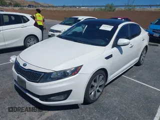 2013 Kia Optima SX with VIN 5XXGR4A65DG168350, listed as a IAAI auction lot 42254369 with 112,496 mi miles and . Bid and sale history available at DreamBid. Image 2.
