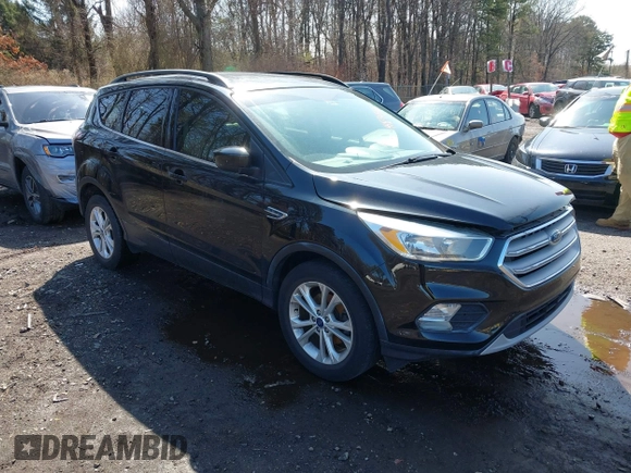2018 Ford Escape SE with VIN 1FMCU0GD2JUA65979, listed as a IAAI auction lot 41894516 with 145,424 mi miles. Bid and sale history available at carsss.com. Image 1.