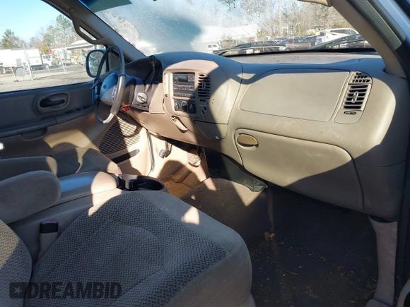 2000 Ford F-150 XL with VIN 1FTZX172XYNB36456, listed as a IAAI auction lot 41554603 with 239,766 mi miles. Bid and sale history available at carsss.com. Image 5.