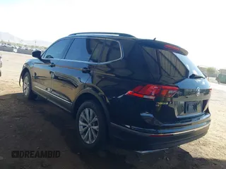 2018 Volkswagen Tiguan SEL with VIN 3VV3B7AX5JM009157, listed as a IAAI auction lot 41745746 with 138,876 mi miles and . Bid and sale history available at DreamBid. Image 3.