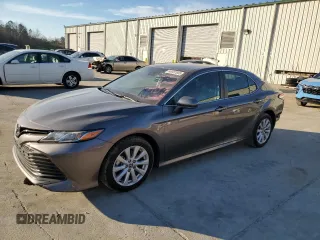2020 Toyota Camry LE with VIN 4T1C11AK3LU945792, listed as a Copart auction lot 46987685 with 87,454 mi miles and Salvage Title. Bid and sale history available at carsss.com. Image 1.