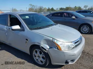 2008 Ford Focus SE with VIN 1FAHP35N48W243314, listed as a IAAI auction lot 42001321 with 210,639 mi miles. Bid and sale history available at carsss.com. Image 6.